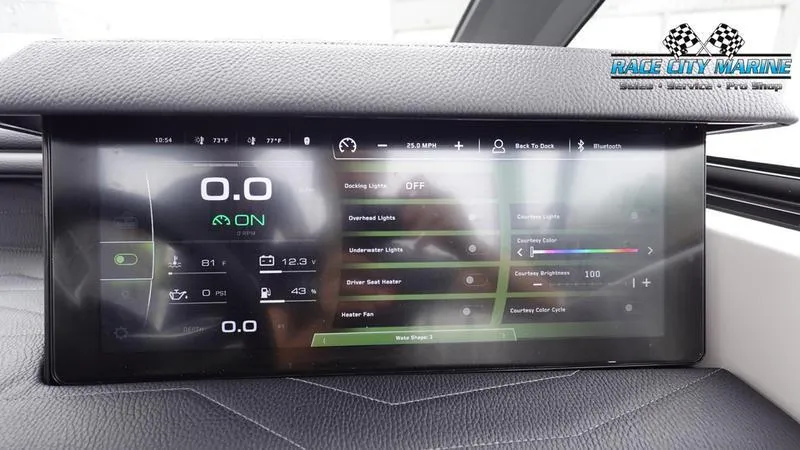 Slide: The Image of 2025 Nautique Super Air Nautique G23 dashboard display with digital controls and settings. - 40