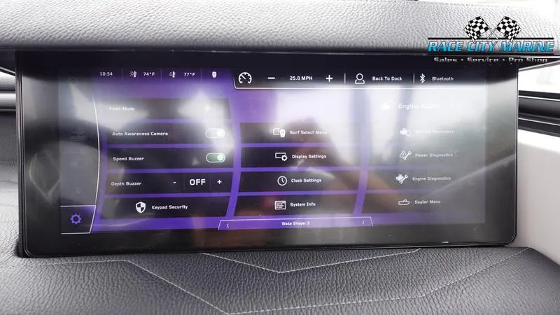 Slide: The Image of 2025 Nautique Super Air Nautique G23 touchscreen display with various control settings. - 42