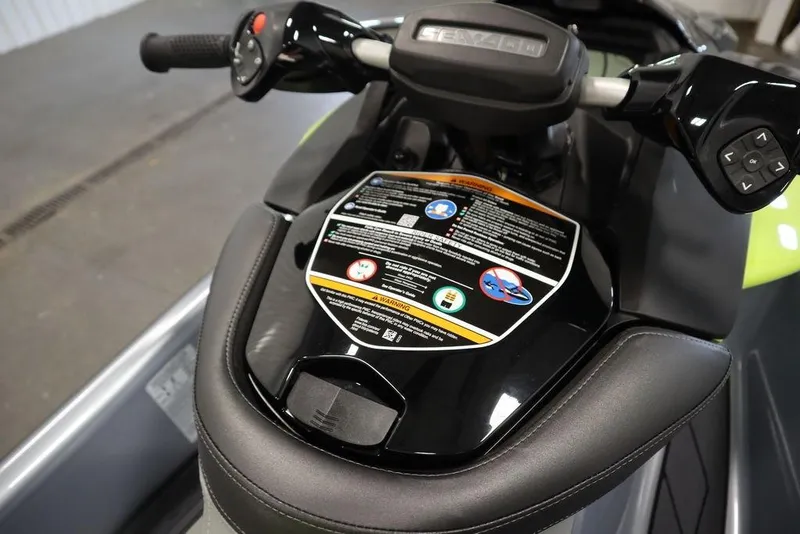 Slide: The Image of 2025 Sea-Doo RXP-X 325 dashboard with controls and safety instructions. - 16