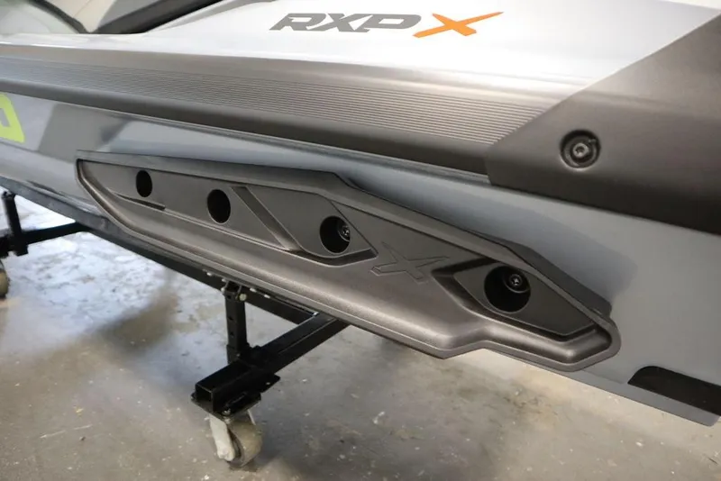 Slide: The Image of 2025 Sea-Doo RXP-X 325 jet ski detail, showcasing sleek design and branding. - 24