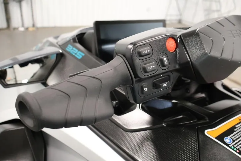 Slide: The Image of 2026 Sea-Doo GTX Limited 325 handlebar controls with VTS buttons and display. - 11