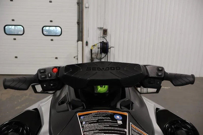 Slide: The Image of 2026 Sea-Doo GTX Limited 325 handlebars in a garage setting. - 12