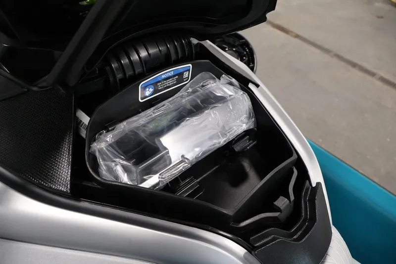 Slide: The Image of Open storage compartment of 2026 Sea-Doo GTX Limited 325 watercraft. - 13