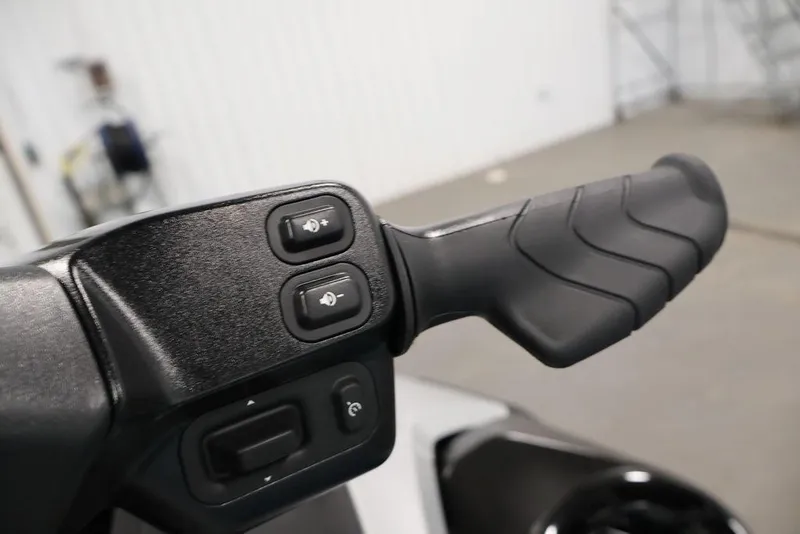 Slide: The Image of Handlebar controls of 2026 Sea-Doo GTX Limited 325, featuring ergonomic grip and buttons. - 15