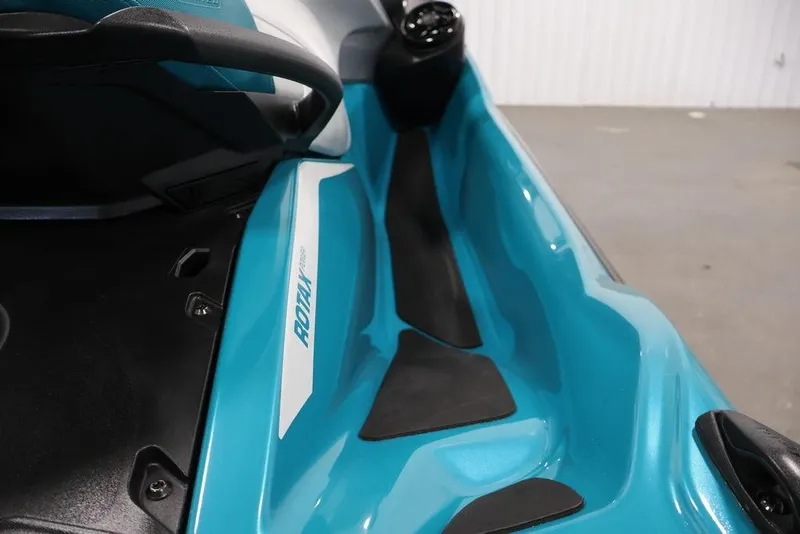 Slide: The Image of 2026 Sea-Doo GTX Limited 325, close-up of teal body and black seat detail. - 16