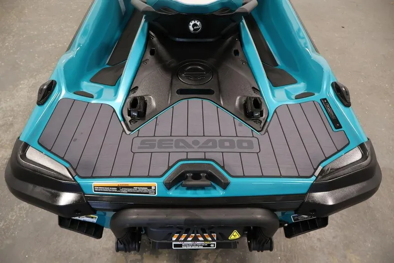Slide: The Image of 2026 Sea-Doo GTX Limited 325, teal and black rear deck view, showcasing sleek design. - 17