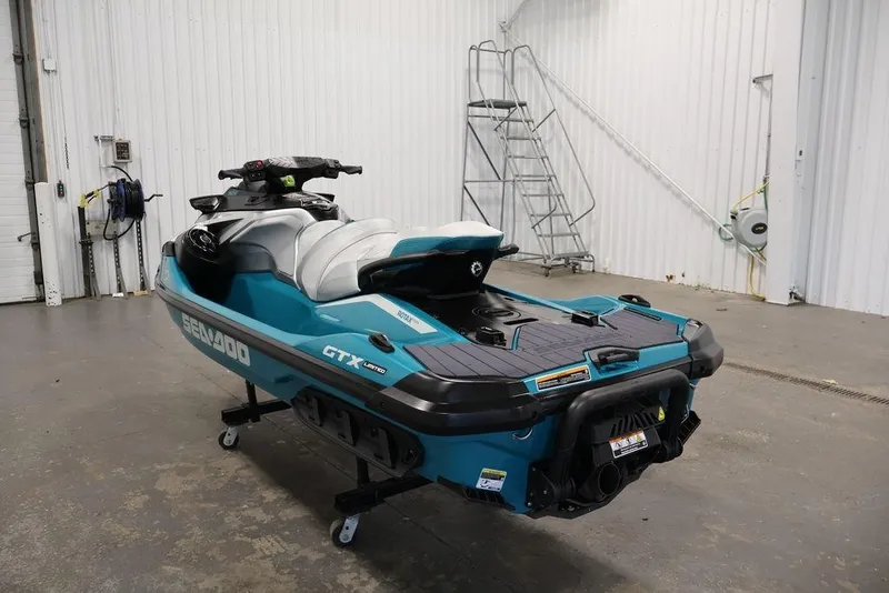 Slide: The Image of 2026 Sea-Doo GTX Limited 325 jet ski in a garage setting. - 5