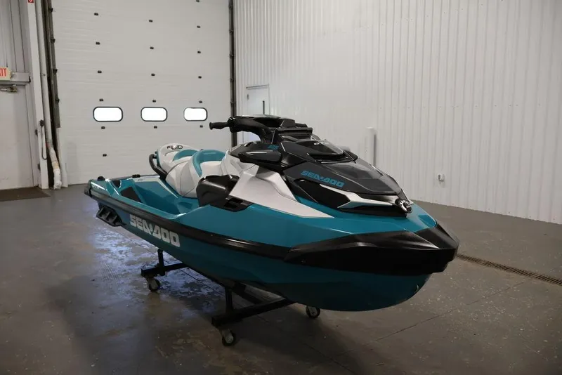 Slide: The Image of 2026 Sea-Doo GTX Limited 325 jet ski in a garage setting. - 6