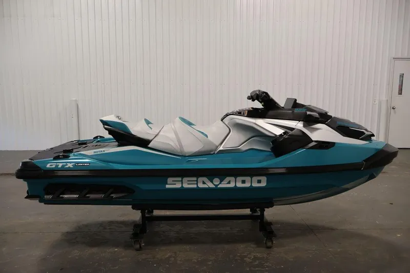 Slide: The Image of 2026 Sea-Doo GTX Limited 325 jet ski in a showroom, side view. - 7