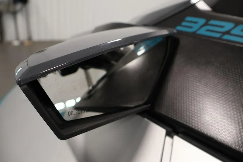 Slide: The Image of Close-up of 2026 Sea-Doo GTX Limited 325 side mirror with sleek design. - 8