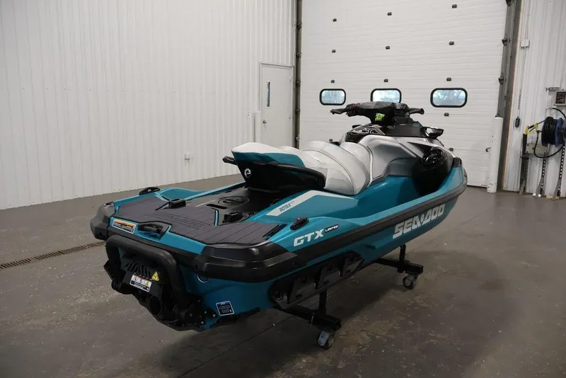 Slide: The Image of 2026 Sea-Doo GTX Limited 325 jet ski in a garage setting. - 9