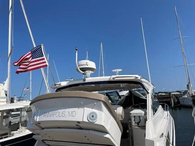 Slide: The Image of 2018 Regal 35 Sport Coupe docked, American flag waving, Annapolis, MD. - 19