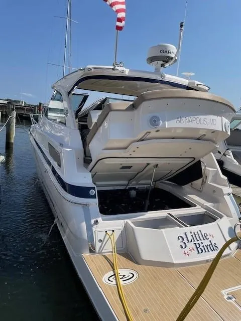 Slide: The Image of 2018 Regal 35 Sport Coupe docked, rear view with open hatch, Annapolis MD. - 21