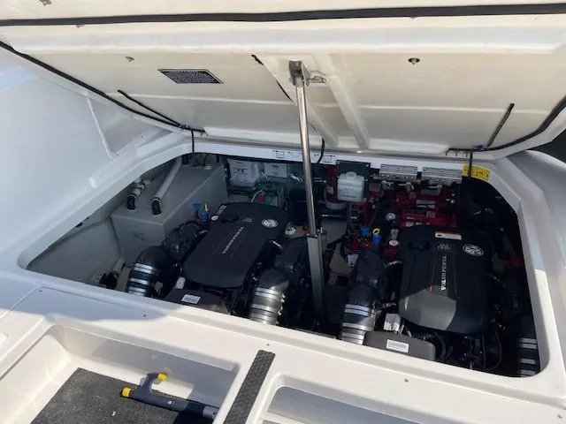 Slide: The Image of Engine compartment of a 2018 Regal 35 Sport Coupe, showcasing dual engines and components. - 22