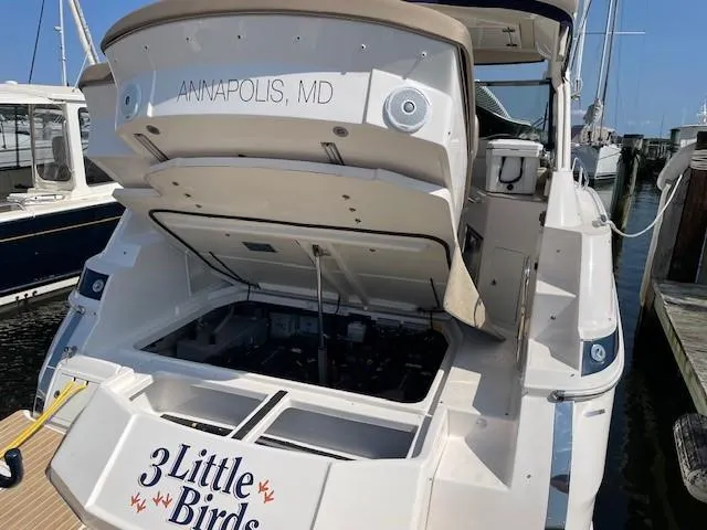 Slide: The Image of 2018 Regal 35 Sport Coupe docked in Annapolis, MD, with open engine compartment. - 30