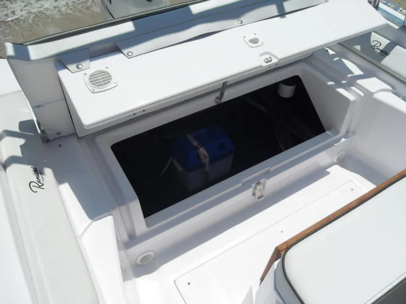 Slide: The Image of Open storage compartment on 2025 Ranieri CAYMAN 19 Sport boat. - 18
