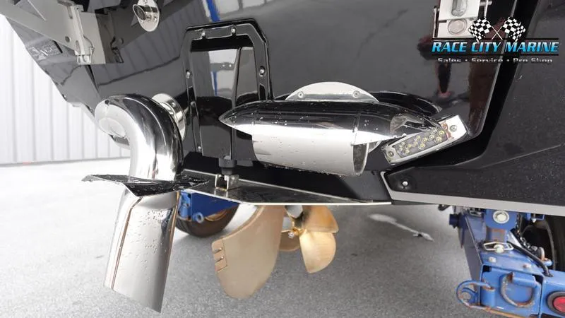 Slide: The Image of 2025 Nautique Super Air Nautique G25 boat propeller and exhaust system close-up. - 10