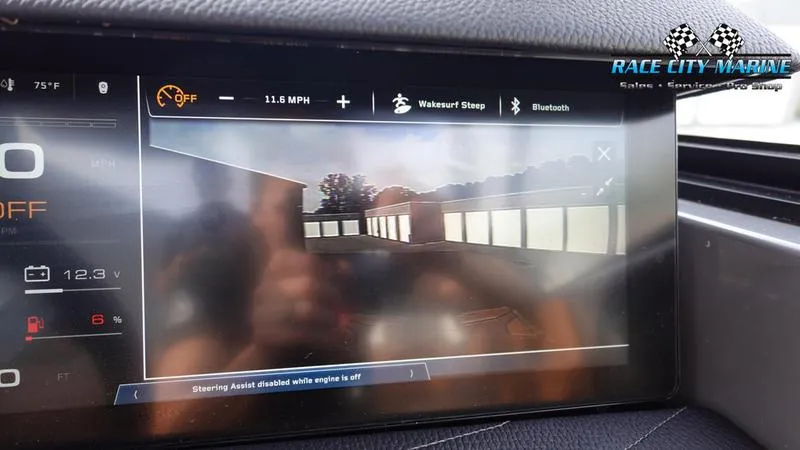 Slide: The Image of Dashboard display of 2025 Nautique Super Air Nautique G25 with camera view and controls. - 38