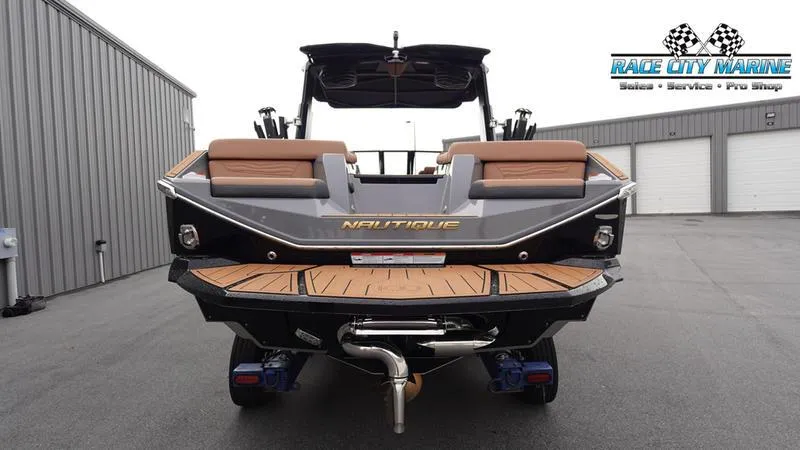 Slide: The Image of 2025 Nautique Super Air Nautique G25 boat rear view at Race City Marine. - 4