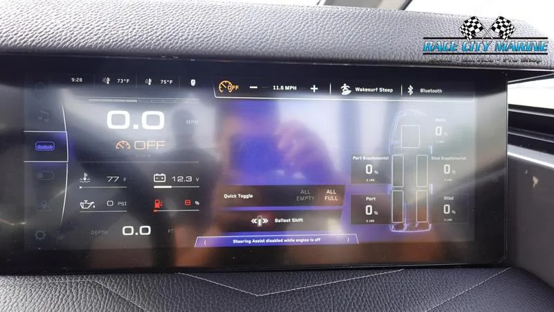 Slide: The Image of 2025 Nautique Super Air Nautique G25 dashboard display with digital controls and navigation. - 40