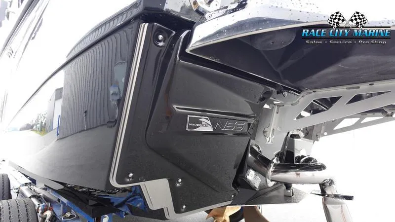 Slide: The Image of 2025 Nautique Super Air Nautique G25 boat hull at Race City Marine. - 9