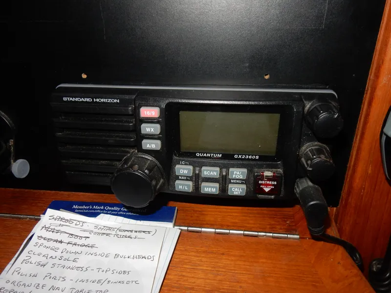 Slide: The Image of Standard Horizon radio on 1997 Island Packet 40 sailboat, with notes nearby. - 20