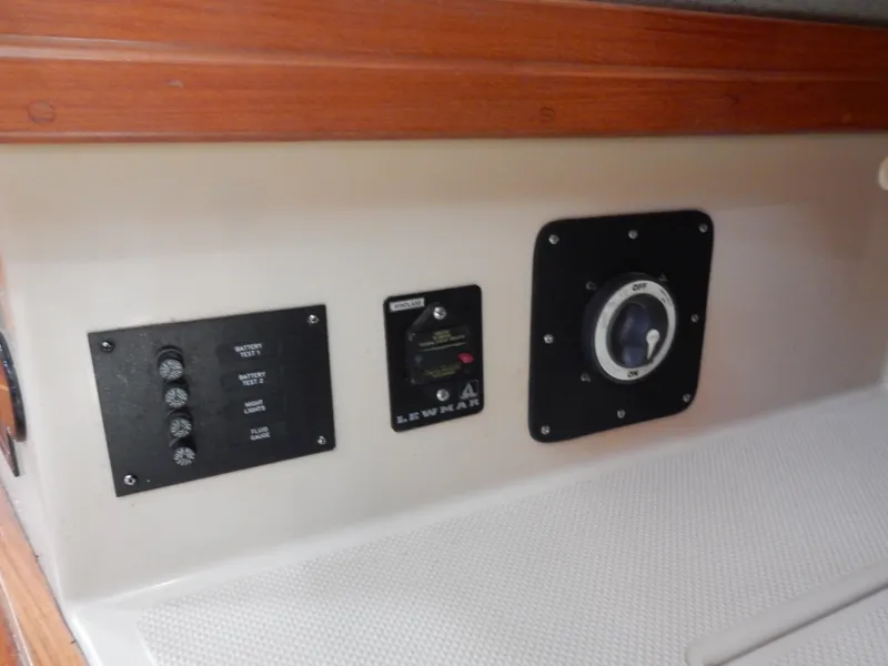 Slide: The Image of Control panel on 1997 Island Packet 40 sailboat interior. - 35