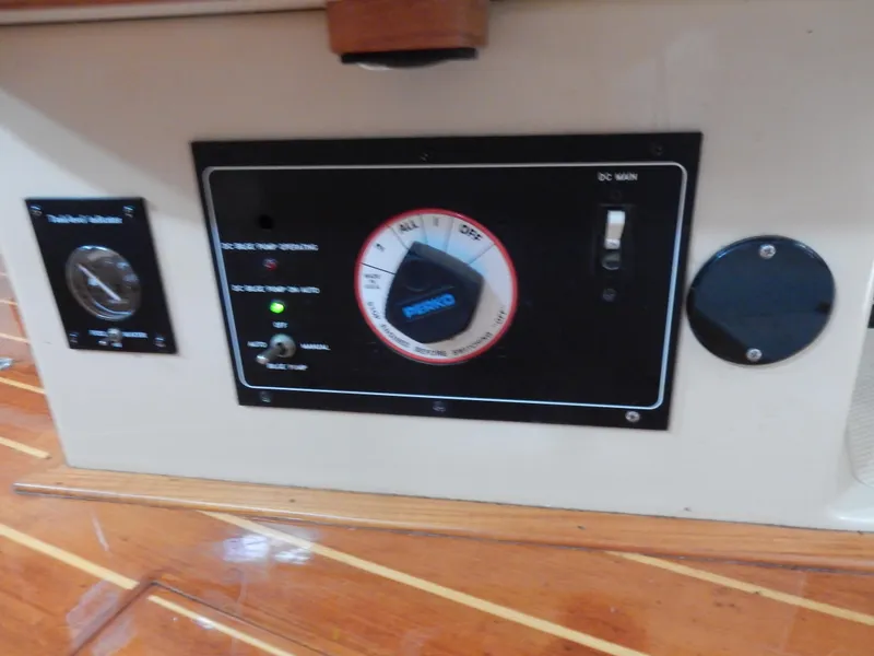 Slide: The Image of Control panel on 1997 Island Packet 40 yacht with wooden flooring. - 37