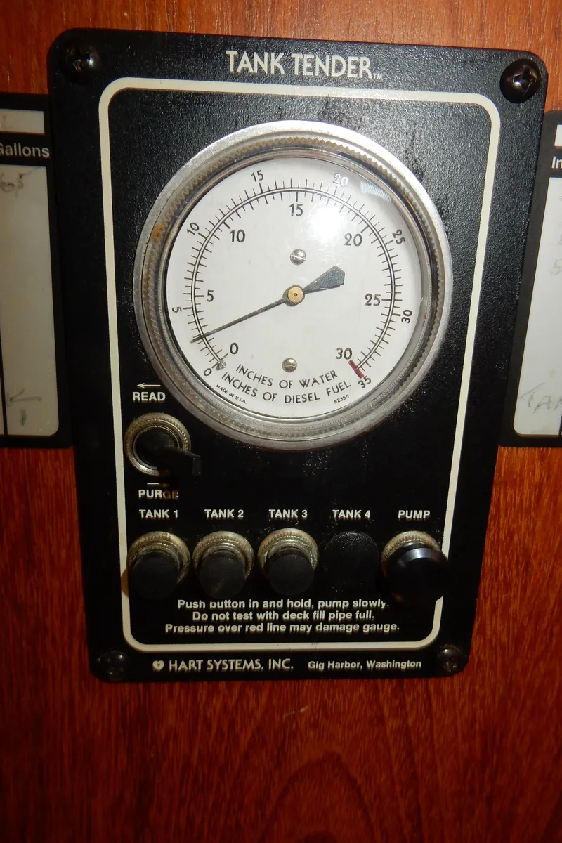 Slide: The Image of Tank Tender gauge on 1997 Island Packet 40 sailboat, showing water and diesel fuel levels. - 40