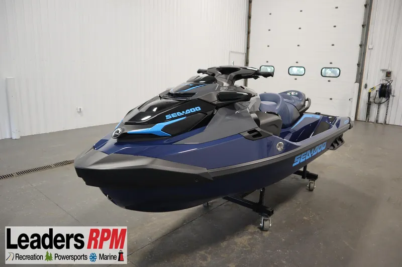 The Image of 2025 Sea-Doo GTX™ 230 jet ski in showroom, featuring advanced tech, audio, iDF, and iBR systems. - 1