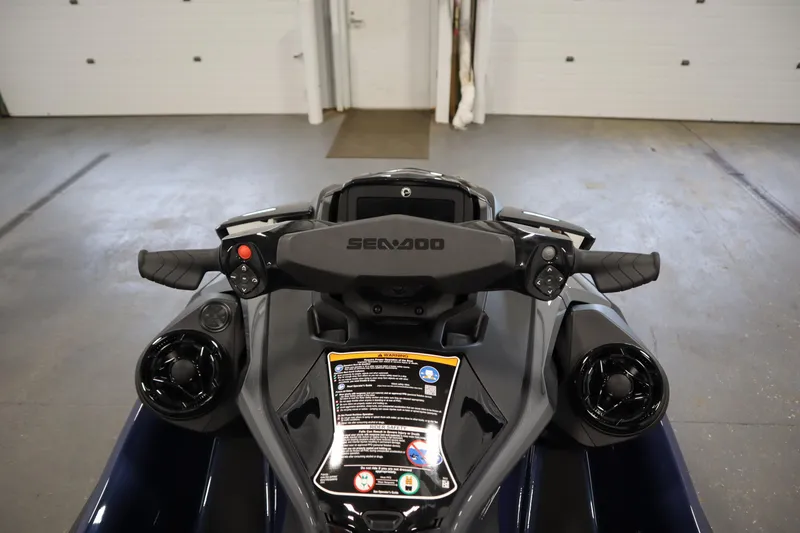 Slide: The Image of 2025 Sea-Doo GTX™ 230 Tech with audio, iDF, iBR features, displayed indoors. - 5