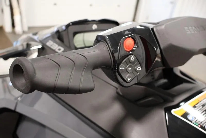 Slide: The Image of Close-up of Sea-Doo GTX 230 2025 handlebar and controls. - 13
