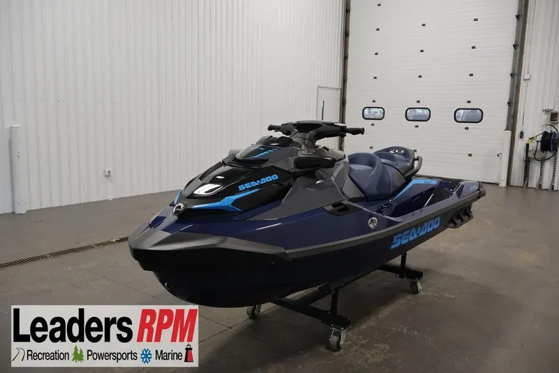 The Image of 2025 Sea-Doo GTX 230 jet ski in a garage. - 3