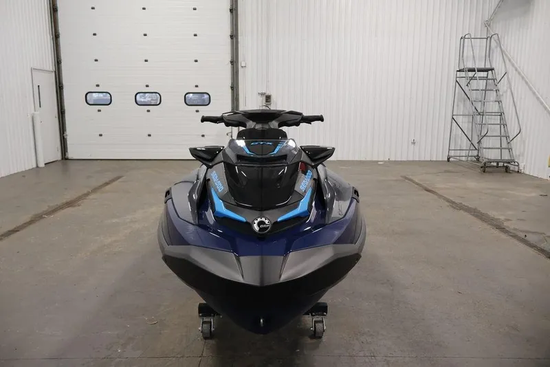 Slide: The Image of 2025 Sea-Doo GTX 230 jet ski in a garage. - 6