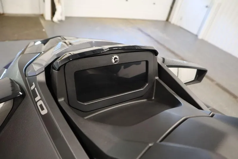 Slide: The Image of 2025 Sea-Doo GTX 170 dashboard close-up in a garage setting. - 14
