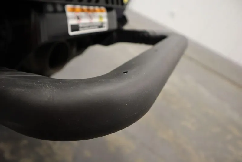 Slide: The Image of Close-up of 2025 Sea-Doo GTX 170 handlebar, showcasing sleek design and texture. - 20