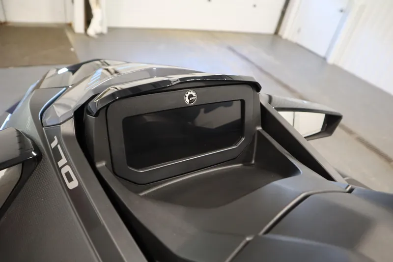 Slide: The Image of 2025 Sea-Doo GTX 170 dashboard with advanced tech features in a showroom setting. - 6