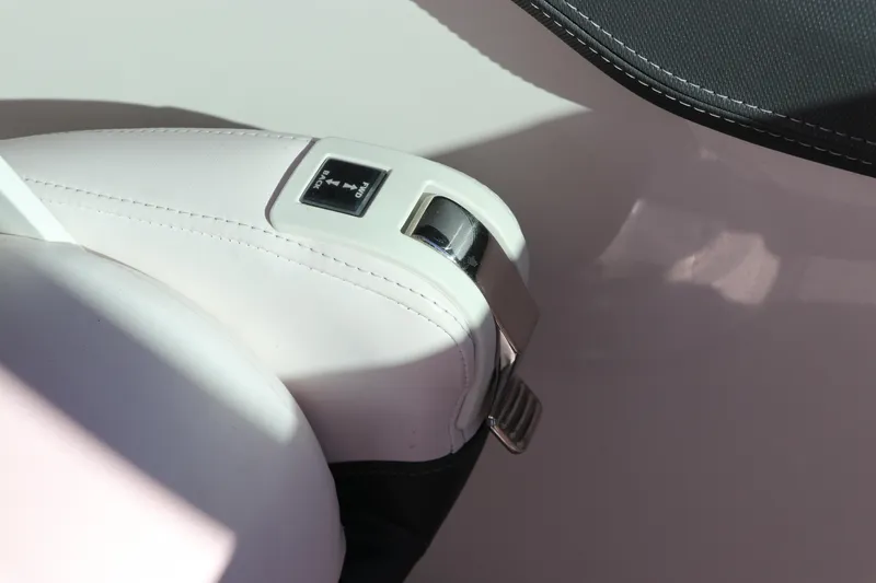 Slide: The Image of Close-up of 2019 Chaparral 297 SSX boat throttle control. - 11