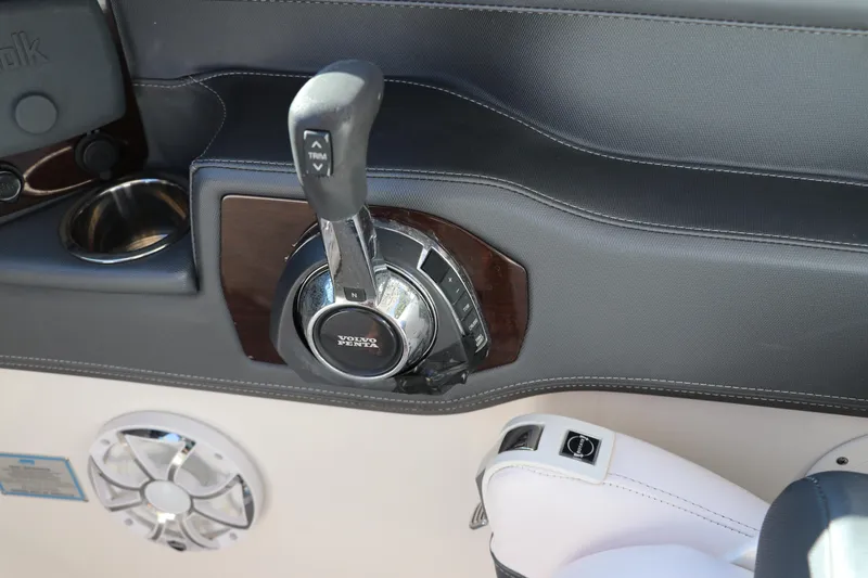 Slide: The Image of Close-up of 2019 Chaparral 297 SSX boat throttle control and speaker. - 18
