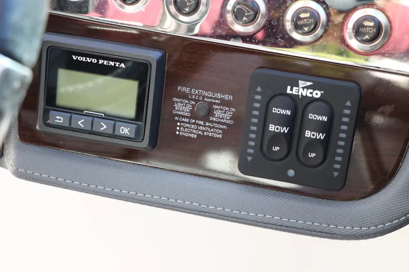 Slide: The Image of Control panel of 2019 Chaparral 297 SSX boat with Volvo Penta and Lenco systems. - 24