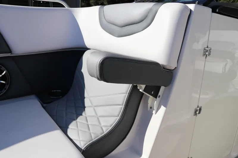 Slide: The Image of 2019 Chaparral 297 SSX boat interior with gray and white seating. - 28