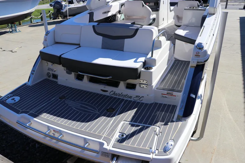 Slide: The Image of 2019 Chaparral 297 SSX boat with spacious seating and sleek design. - 3
