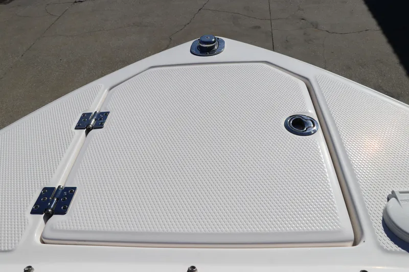 Slide: The Image of 2019 Chaparral 297 SSX boat deck with hatch and hardware. - 32