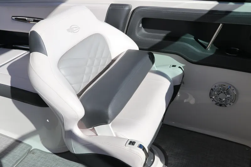 Slide: The Image of Luxury seating in 2019 Chaparral 297 SSX boat, featuring white and gray upholstery. - 9