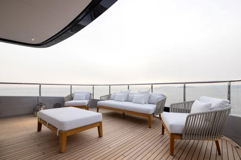 Slide: The Image of Luxurious deck seating on 2025 Benetti Oasis 34M yacht with ocean view. - 17