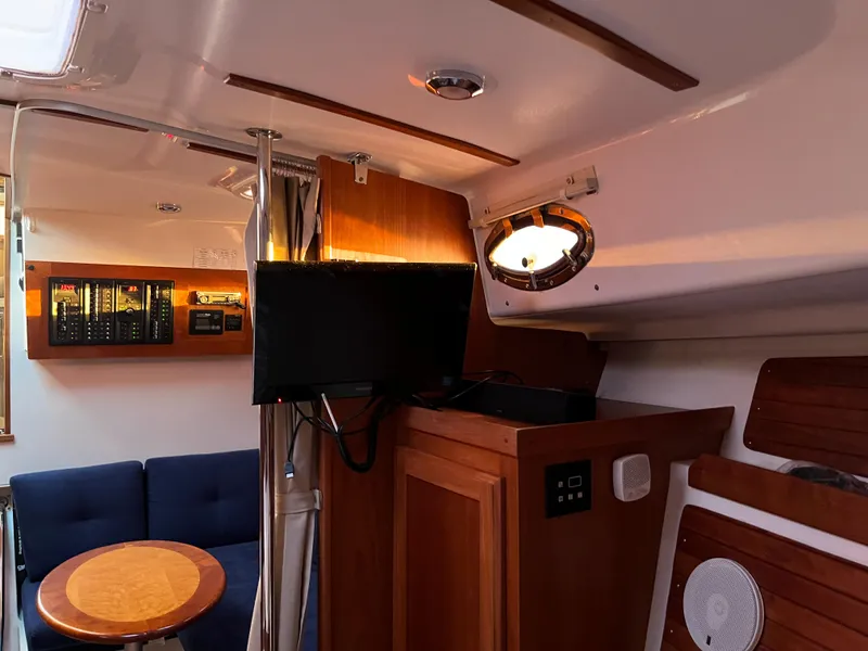 Slide: The Image of Interior of 2013 Back Cove 34 boat with cozy seating and modern amenities. - 17