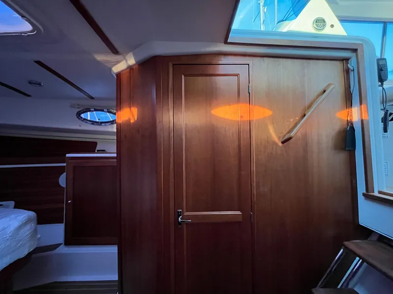 Slide: The Image of Interior of 2013 Back Cove 34 boat with wooden cabinetry and modern design. - 20