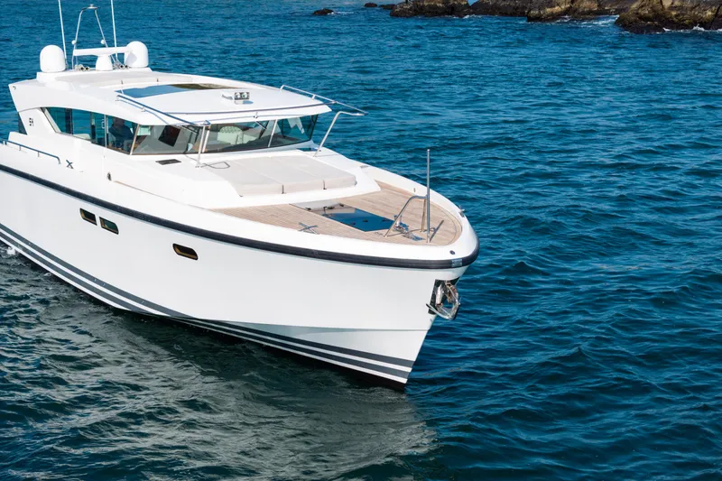 Slide: The Image of 2017 Delta Powerboats 54 IPS cruising on open water. - 13