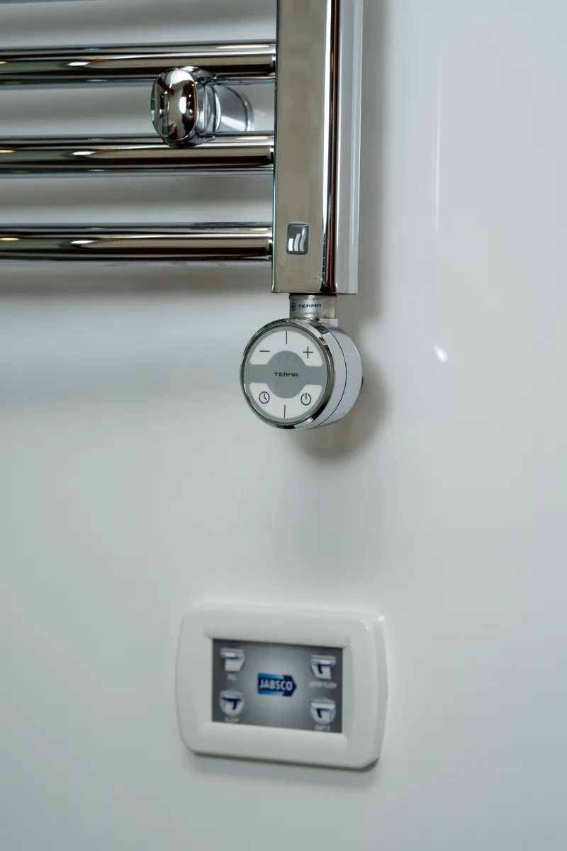 Slide: The Image of Delta Powerboats 54 IPS 2017 yacht interior control panel and chrome fixture. - 45