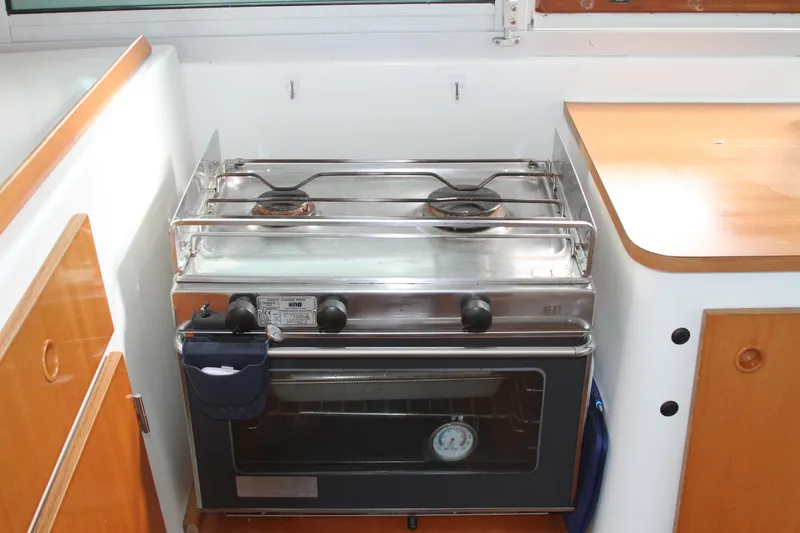 Slide: The Image of Compact kitchen stove in 2004 Lagoon 380 catamaran galley. - 22